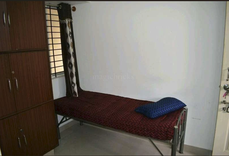 Single bed room with wardrobe